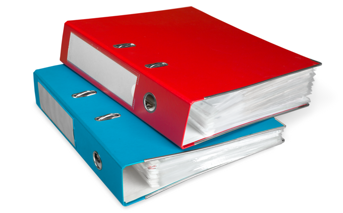 Red & Blue Three-Ring Binders Holding Dental SOPs